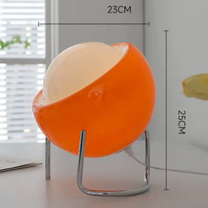 luminária de mesa retrô, luminária bauhaus, abajur vidro laranja, luminária moderna decorativa, abajur colorido quarto, luminária decorativa design, luminária para sala bauhaus, luminária minimalista mesa, iluminação de design, luminária de vidro colorida, abajur elegante vintage