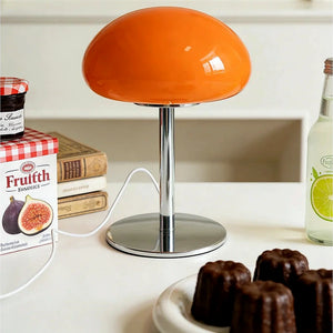 Abajur Cogumelo de Vidro LED USB Laranja Auri sobre mesa com luz suave