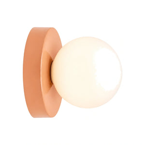 Arandela de Parede Redonda de Vidro Fosco Rosa em fundo branco
